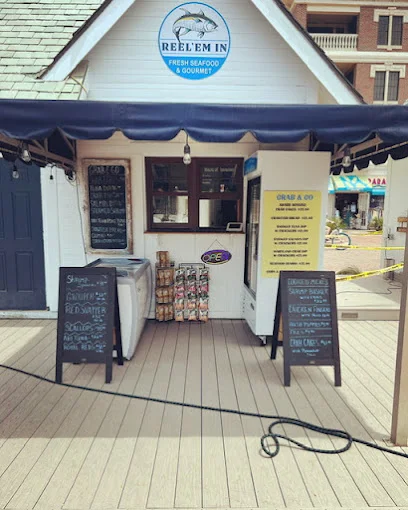 Reel ‘Em In Fresh Seafood and Gourmet of Seacrest located in Peddler's Pavilion on 30A